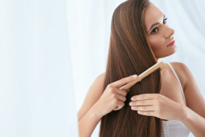 woman combing hair