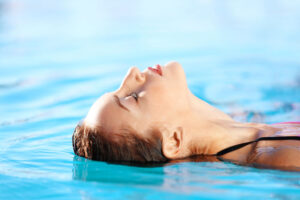 woman swimming in pool